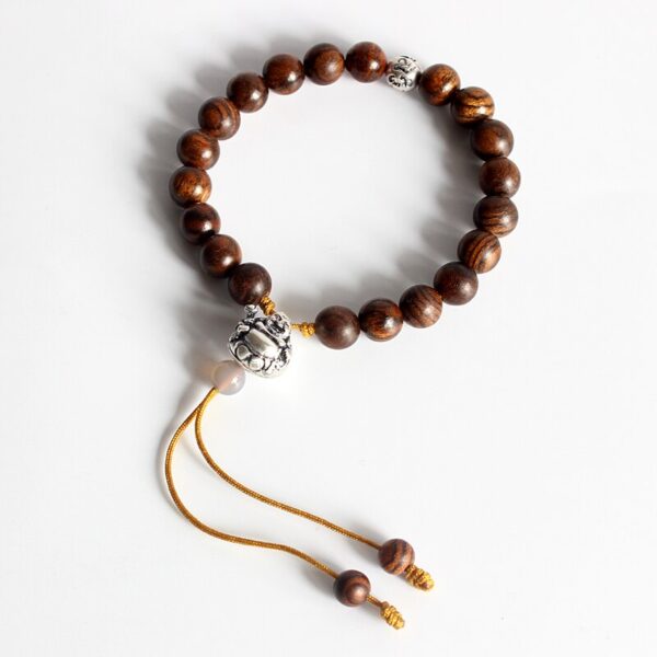 Bracelet bouddha rieur en bois naturel - Élégance et sérénité pour tous