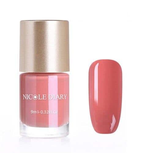 Vernis à ongle rose corail - Couleur tendance pour des ongles éclatants